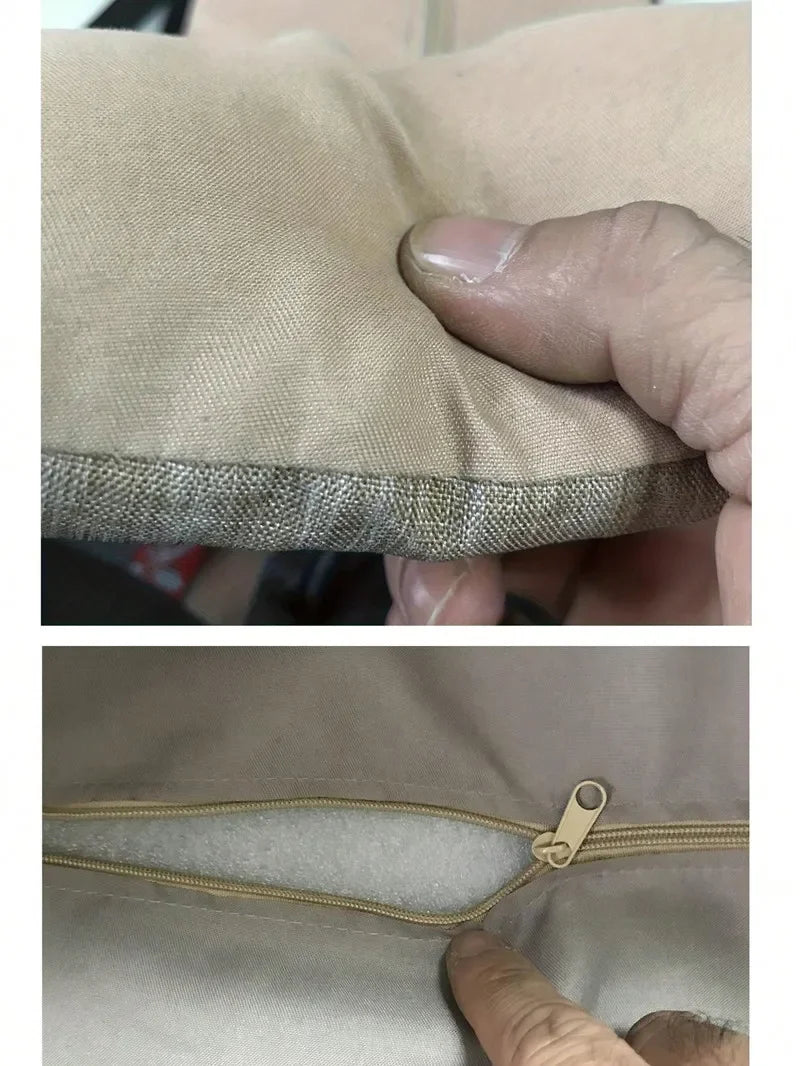 Close-up of hand pressing beige Carcader pillow and unzipped cushion cover showing stuffing